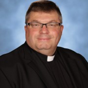 Fr. Brian Cokonougher: Priest in Solidum